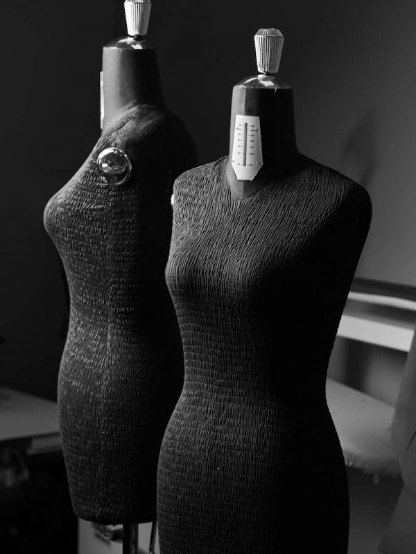 Professional tailor manikin for fitting clothes. Tailor atelier - handmade exclusive clothes making and repair, private business, creative occupation concept